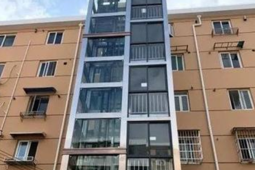 齊心,是給老舊小區加裝電梯的關鍵